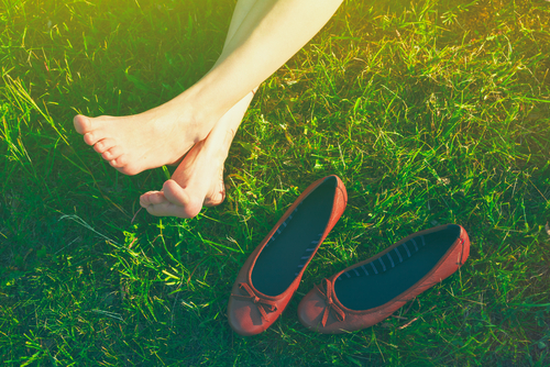 Girls,Legs,Lying,In,Grass,Barefoot,Without,Shoes