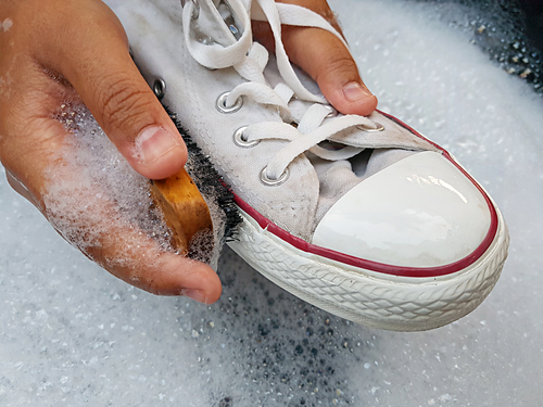 Shoes,Or,Sneakers,In,A,Wash,Basin,With,Soapy,Water.washing