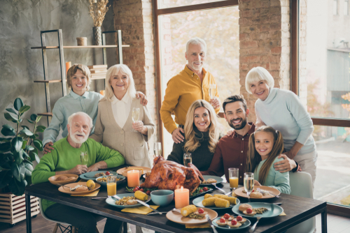 Photo,Of,Big,Family,Standing,Hugging,Feast,Table,Holiday,Roasted