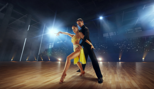 Couple,Dancers,Perform,Latin,Dance,On,Large,Professional,Stage.,Ballroom