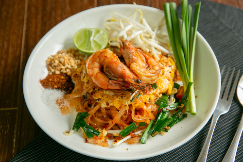 Pad,Thai,Placed,On,A,Wooden,Table