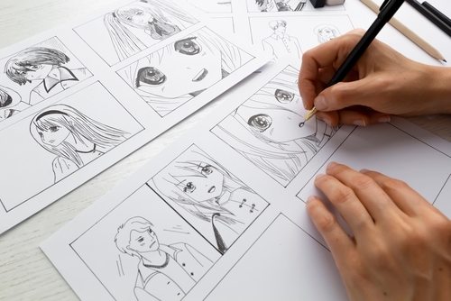 An,Artist,Draws,A,Storyboard,Of,An,Anime,Comics,Book.