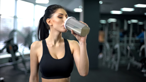 Sporty,Woman,Drinking,Protein,Shake,After,Workout,,Muscle,Gain,Nutrition,