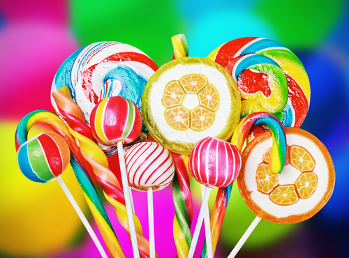 Colorful,Candies,And,Sweets,In,The,Background,Of,Balloons