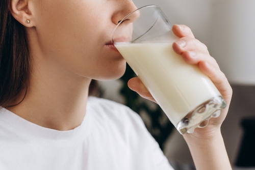 Cropped,Shot,Healthy,Young,Woman,Drinking,Milk,With,Calcium,For