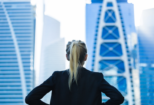 Business,Challenge.,Confident,Businesswoman,Overlooking,The,City,Center,High-rises.