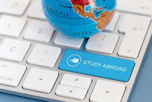 Study,Abroad,And,Keyboard,Concept