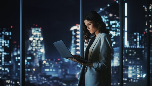 Big,City,Modern,Office,At,Night:,Successful,Young,Businesswoman,Standing