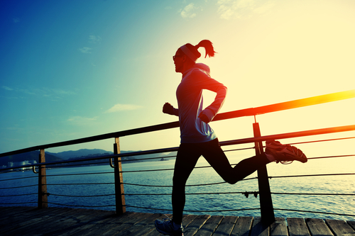 Healthy,Lifestyle,Sports,Woman,Running,On,Wooden,Boardwalk,Sunrise,Seaside