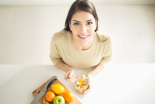 Healthy,Looking,Cheerful,Woman,Eating,Homemade,Organic,Fruit,Mix,Fruit